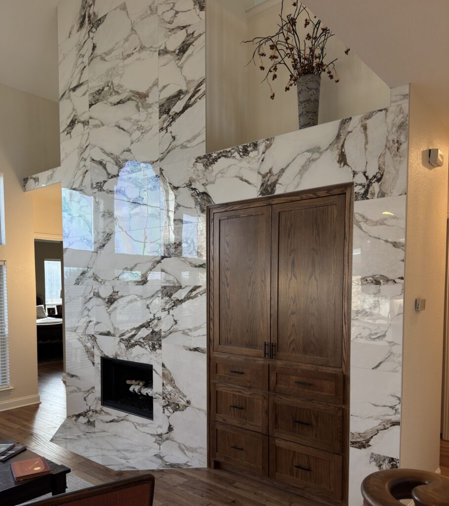 Rockwall TX home remodel with marble tile fireplace and hardwood floors
